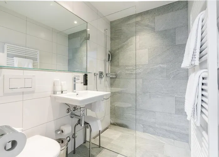 فندق Alpensonne - Panoramazimmer & Restaurant أروسا